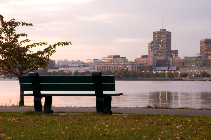 Picture of a bench in front of the Charles River