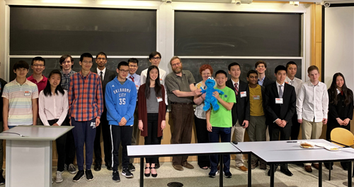 Cookie Monster, Prof. Pavel Etingof, and Dr. Tanya Khovanova with PRIMES students and mentors